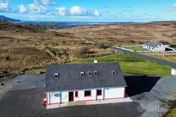  AERIAL REAR VIEW OF HOUSE WITH LOUGHRAS BAY, ROSBEG BAY & SLIAGH A TUA IN THE BACKGROUND