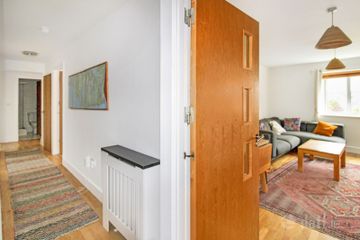 ENTRANCE HALL SHOWING LIVING TO BEDROOMS