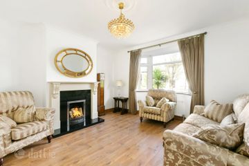 Main reception room with an open fireplace