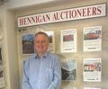 Hennigan Auctioneers logo
